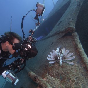 Photographer with Lionfish