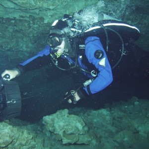 Troy on his scooter in Cave Training