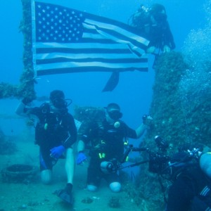 S.U.D.S. soldies with American Flag on Capt. Dan