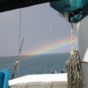 Rainbow_over_stern_of_Island_Skipper