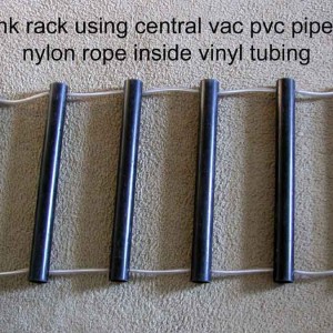 Tank rack using central vac pvc pipe & nylon rope inside vinyl tubing