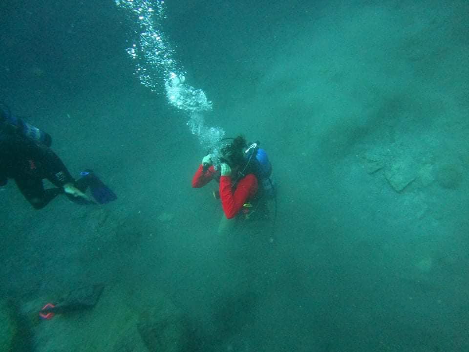 Mask Clearing On Knees At The Bottom Of Blue Hole